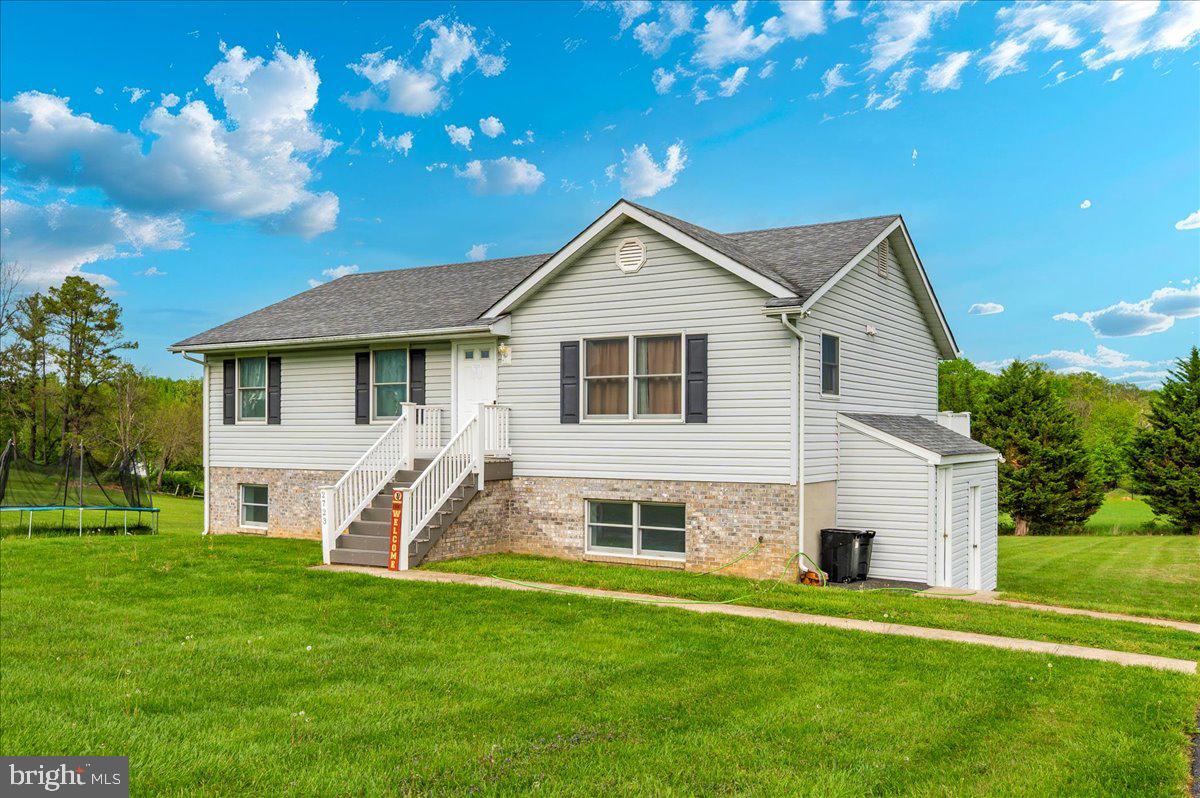 2723 Old Washington Road, Unit B Westminster, MD 21157 - Photo 36 of 37 a view of a house with a yard