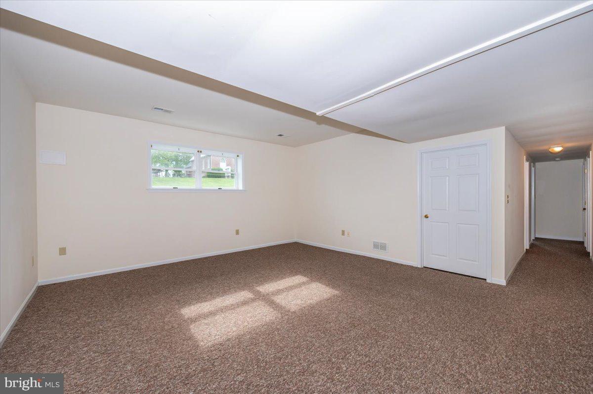 2723 Old Washington Road, Unit B Westminster, MD 21157 - Photo 4 of 37 a view of an empty room with a window