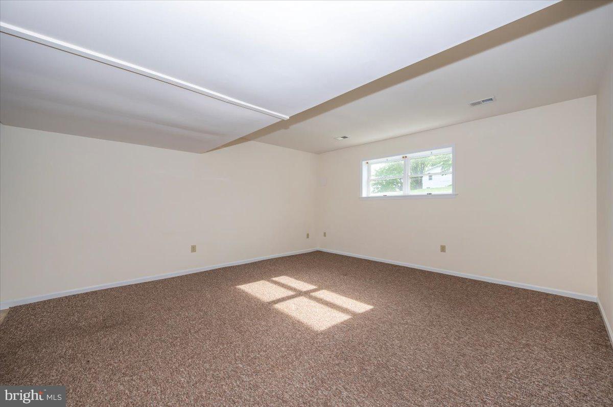2723 Old Washington Road, Unit B Westminster, MD 21157 - Photo 6 of 37 an empty room with windows