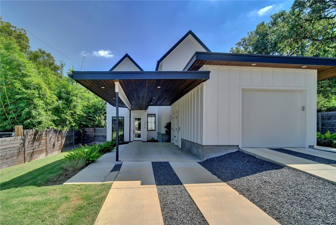 2705 South 4th Street, Unit A Austin, TX 78704 - Photo 1 of 1 a front view of a house with a yard