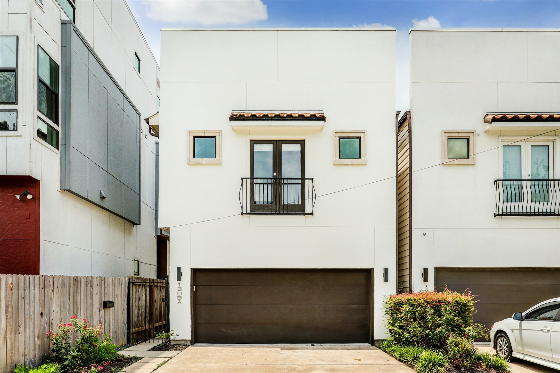 1309 Laird Street, Unit A Houston, TX 77008 - Photo 1 of 22 a front view of a house with stairs