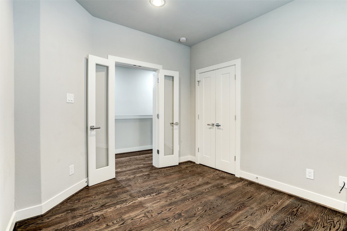 1309 Laird Street, Unit A Houston, TX 77008 - Photo 15 of 22 a view of an empty room with wooden floor