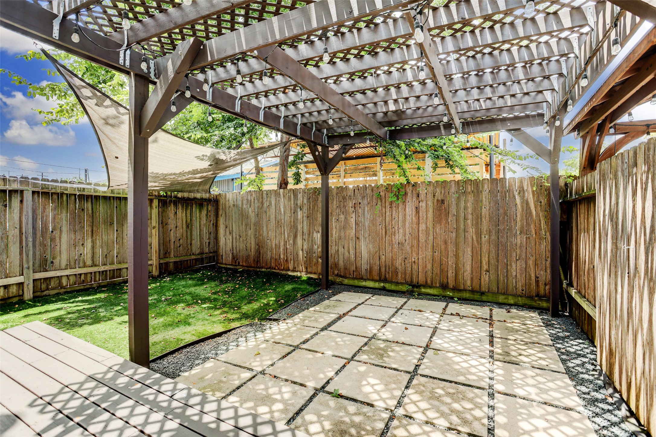 1309 Laird Street, Unit A Houston, TX 77008 - Photo 22 of 22 a view of a backyard with pathway
