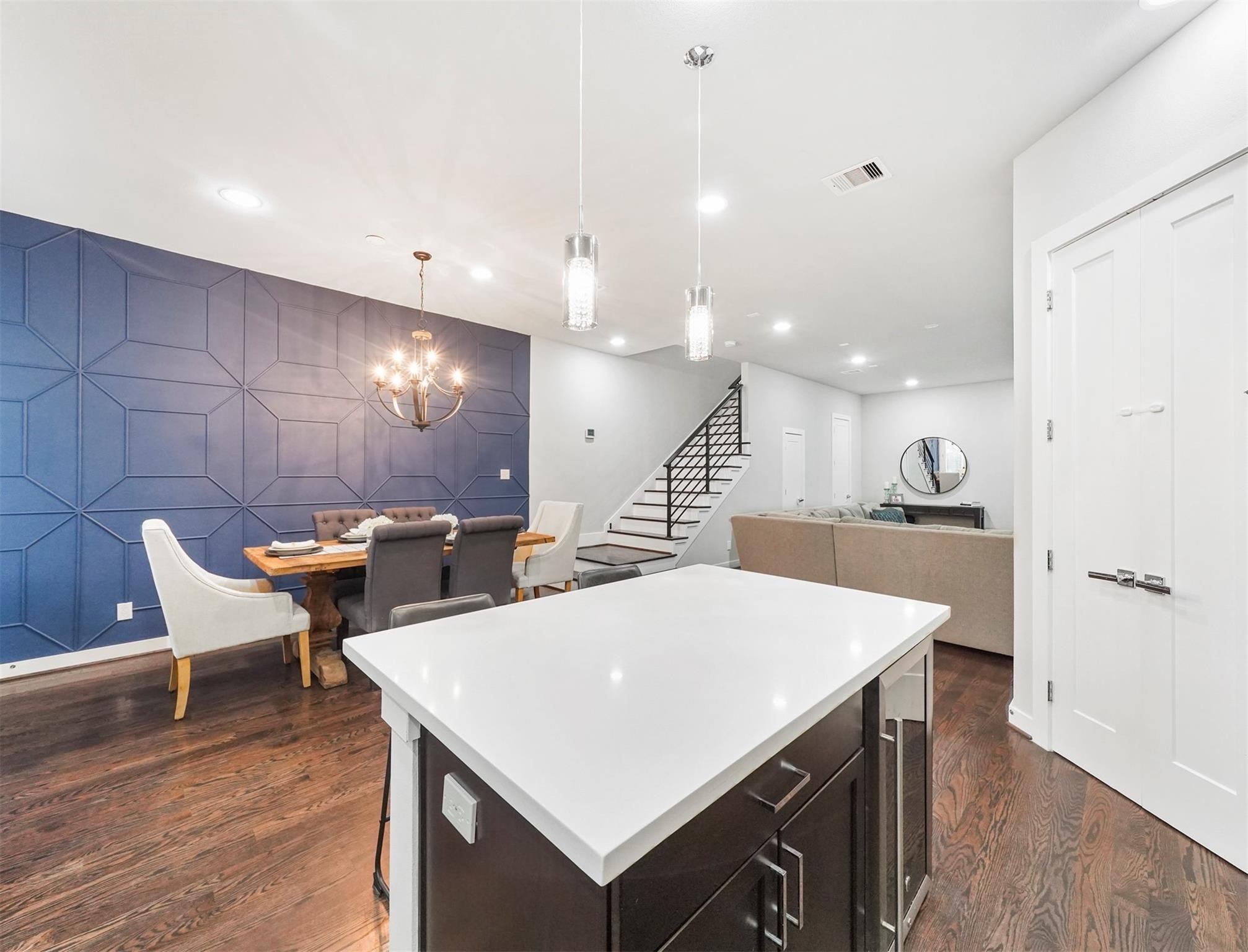 1309 Laird Street, Unit A Houston, TX 77008 - Photo 5 of 22 a large kitchen with a table and chairs