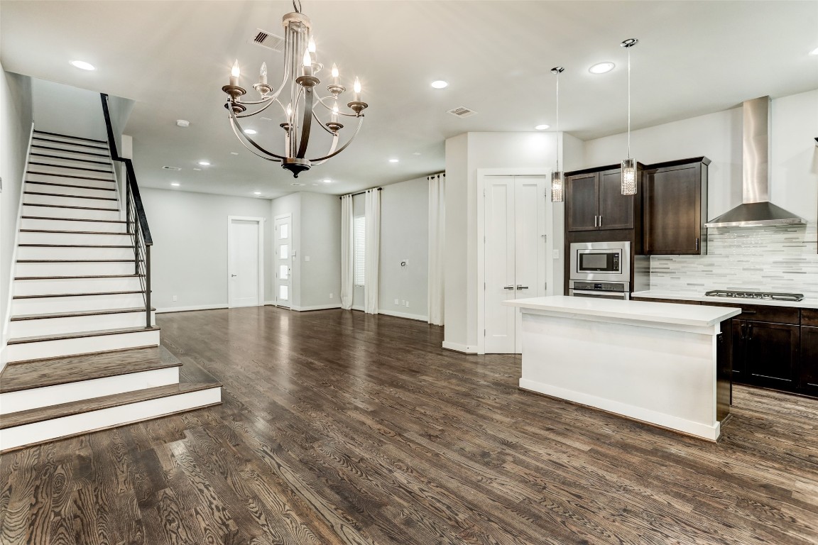 1309 Laird Street, Unit A Houston, TX 77008 - Photo 8 of 22 a view of a kitchen with a sink and refrigerator