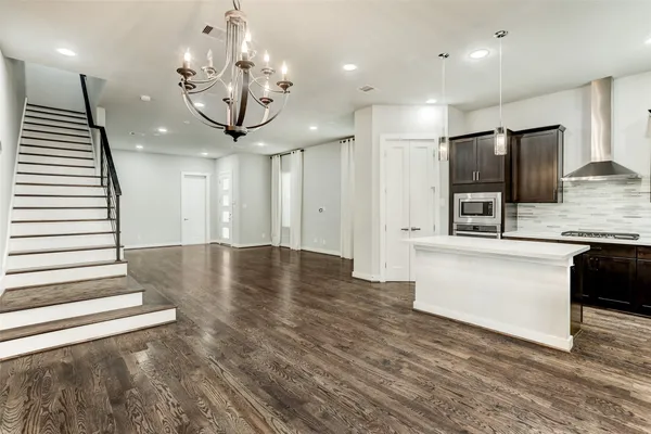 a view of a lobby with furniture and a chandelier