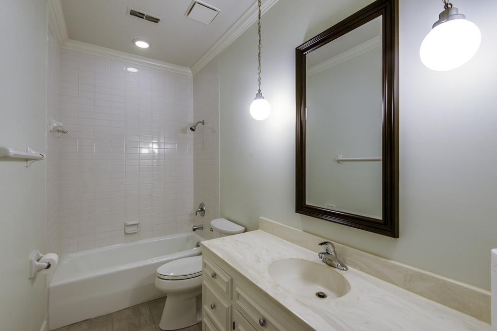 110 Prospect Hill Nashville, TN 37205 - Photo 18 of 23 a bathroom with a sink a toilet and shower
