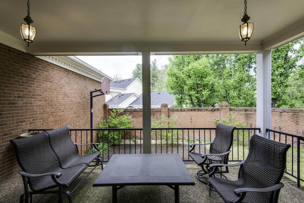 110 Prospect Hill Nashville, TN 37205 - Photo 22 of 23 a view of a porch with furniture and wooden floor