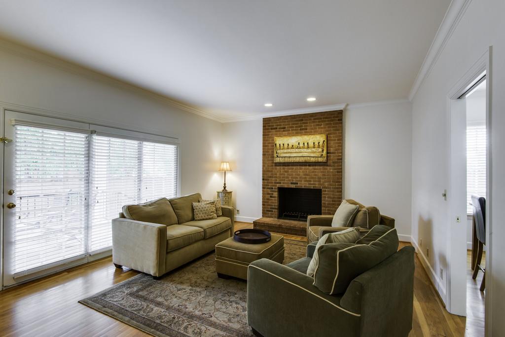 110 Prospect Hill Nashville, TN 37205 - Photo 10 of 23 a living room with furniture and a fireplace