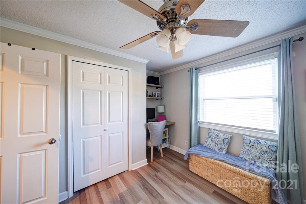 1032 Ravendale Drive Charlotte, NC 28216 - Photo 14 of 20 a living room with furniture and a window
