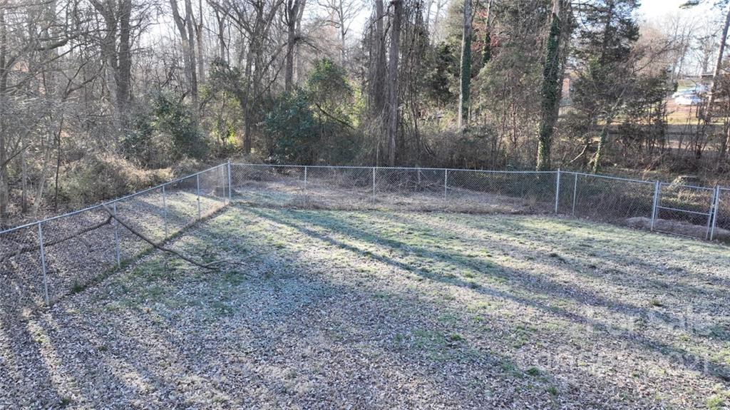1032 Ravendale Drive Charlotte, NC 28216 - Photo 18 of 20 a view of a backyard