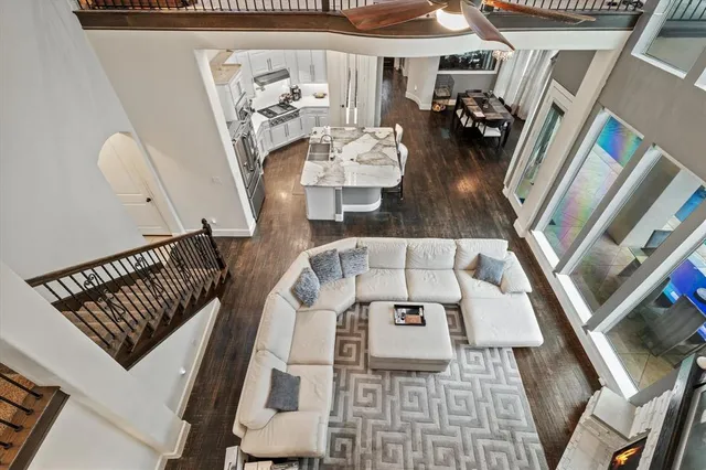 a view of living room with furniture and rug