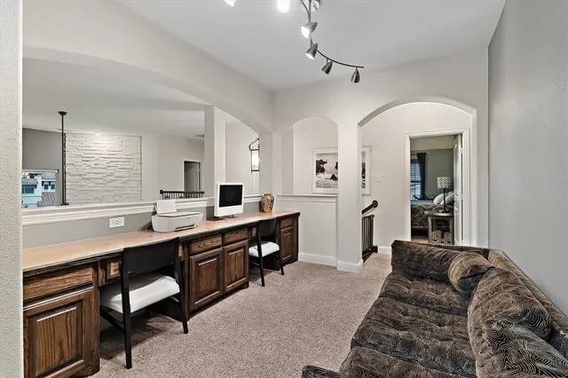 a living room with furniture a dining table and with wooden floor