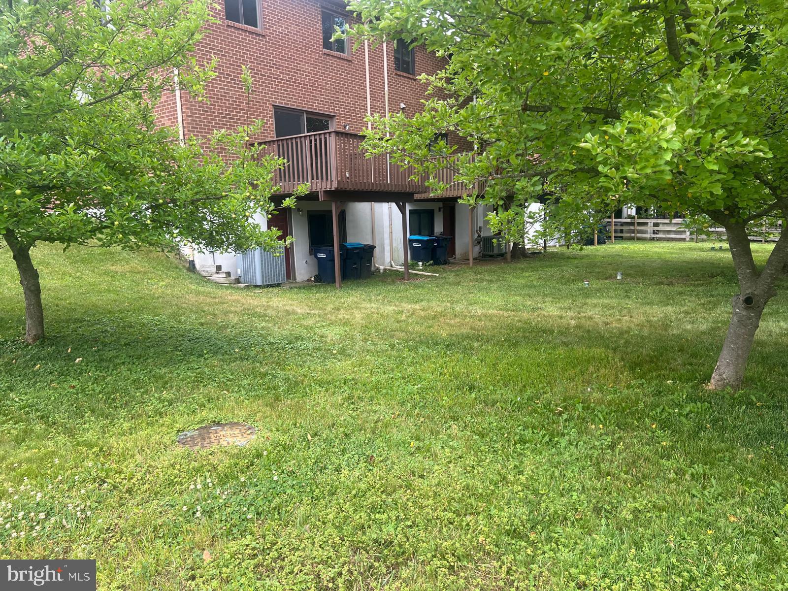 100 Conway Court Exton, PA 19341 - Photo 6 of 16 Lush green space beneath a cozy deck.