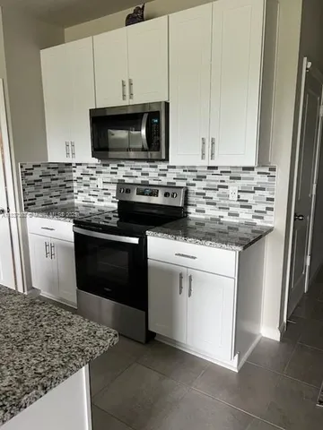 $430,000 | 6349 Topsail Drive, West Palm Beach, FL 33413