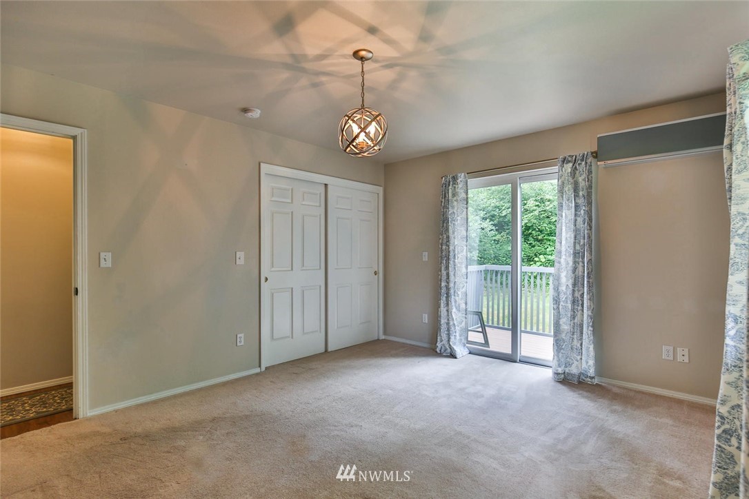 15519 OK Mill Road Snohomish, WA 98290 - Photo 12 of 32 a view of an empty room with a window