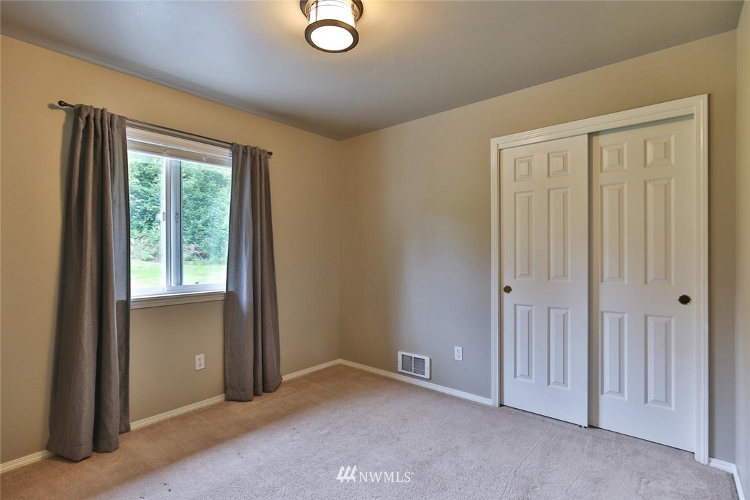 15519 OK Mill Road Snohomish, WA 98290 - Photo 15 of 32 a view of an empty room with a window