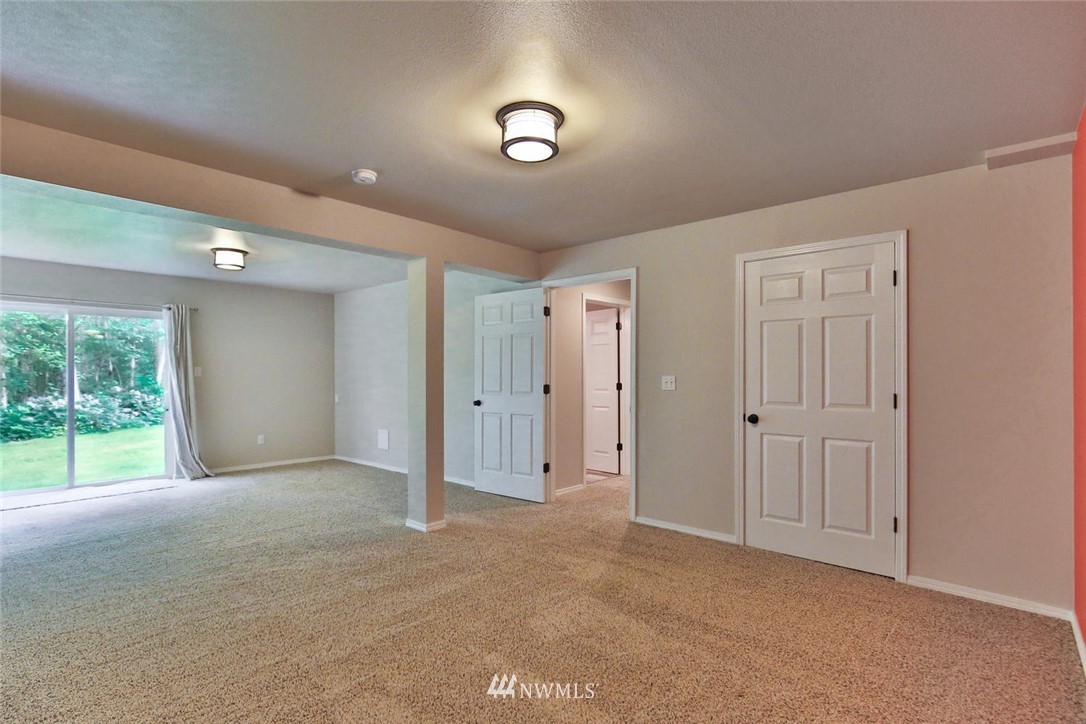 15519 OK Mill Road Snohomish, WA 98290 - Photo 19 of 32 a view of an empty room with a window
