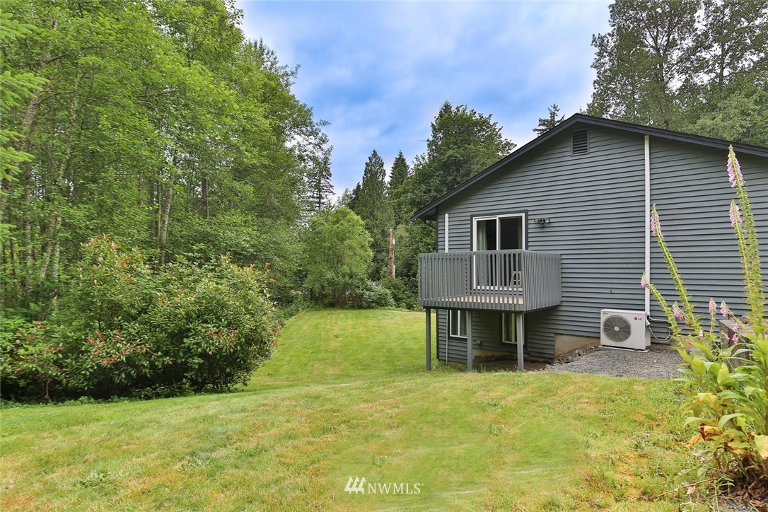 15519 OK Mill Road Snohomish, WA 98290 - Photo 24 of 32 a view of a house with backyard and garden