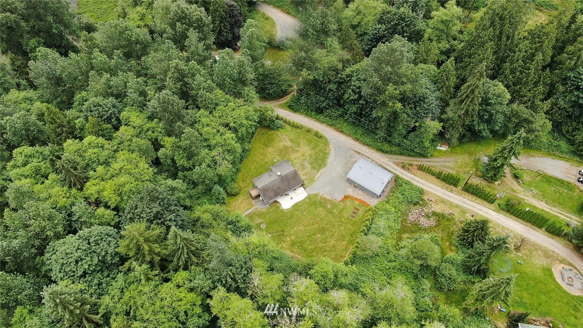 15519 OK Mill Road Snohomish, WA 98290 - Photo 29 of 32 a view of a lake with a yard