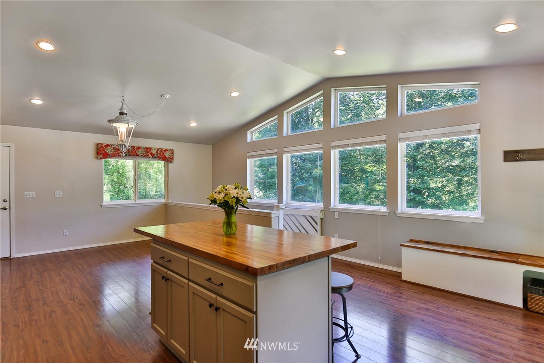 15519 OK Mill Road Snohomish, WA 98290 - Photo 5 of 32 a kitchen with a window appliances and wooden floor