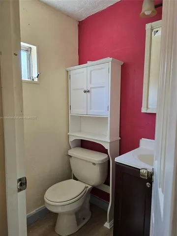 a bathroom with a toilet
