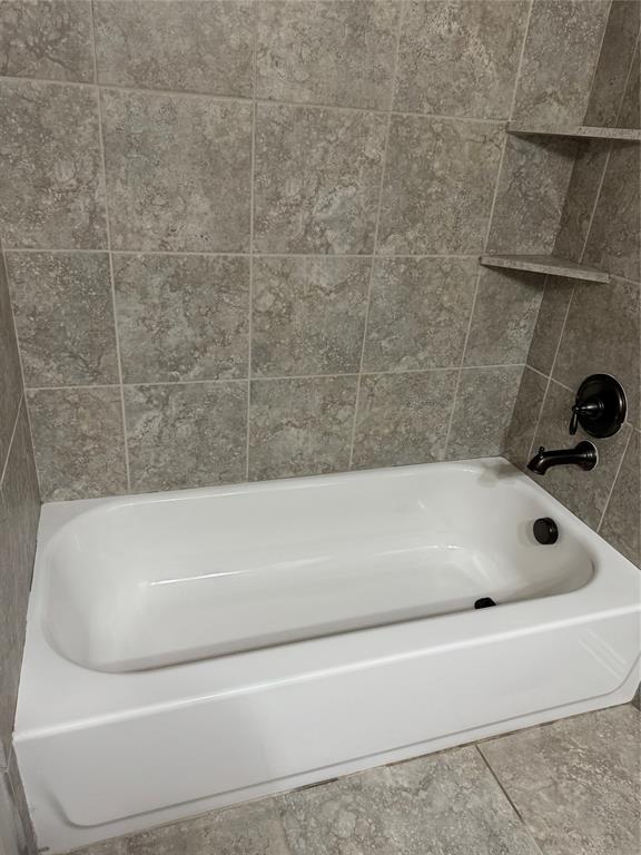 236 Archer Way Forney, TX 75126 - Photo 21 of 35 a bathroom with a bathtub