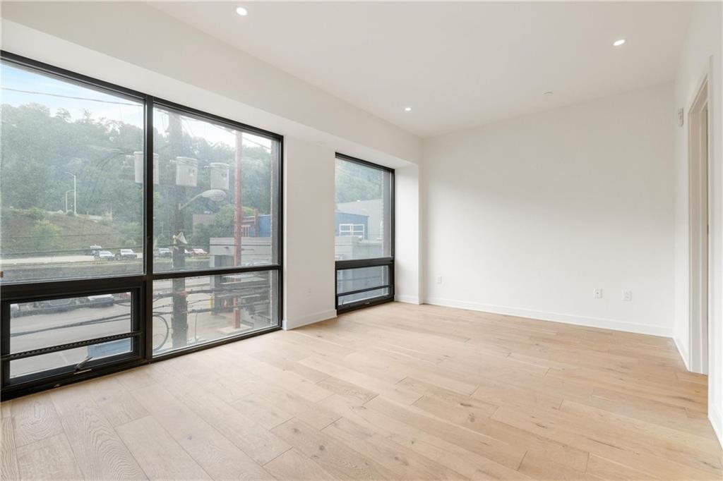 2330 Penn Avenue, Unit 203 Pittsburgh, PA 15222 - Photo 20 of 37 a view of an empty room with a window