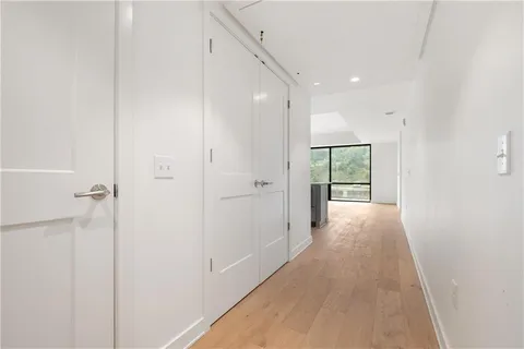 a bathroom with a sink toilet and mirror