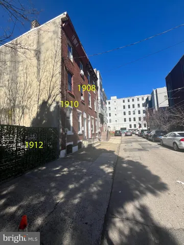 a city view with tall buildings and a street view
