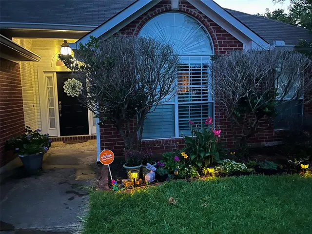 a front view of a house having yard