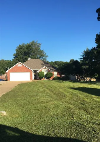 a view of an outdoor space and a yard