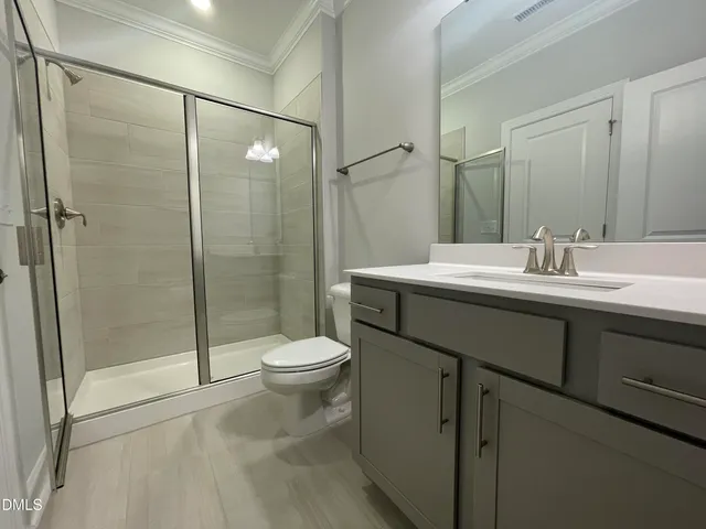 a view of a hallway with windows