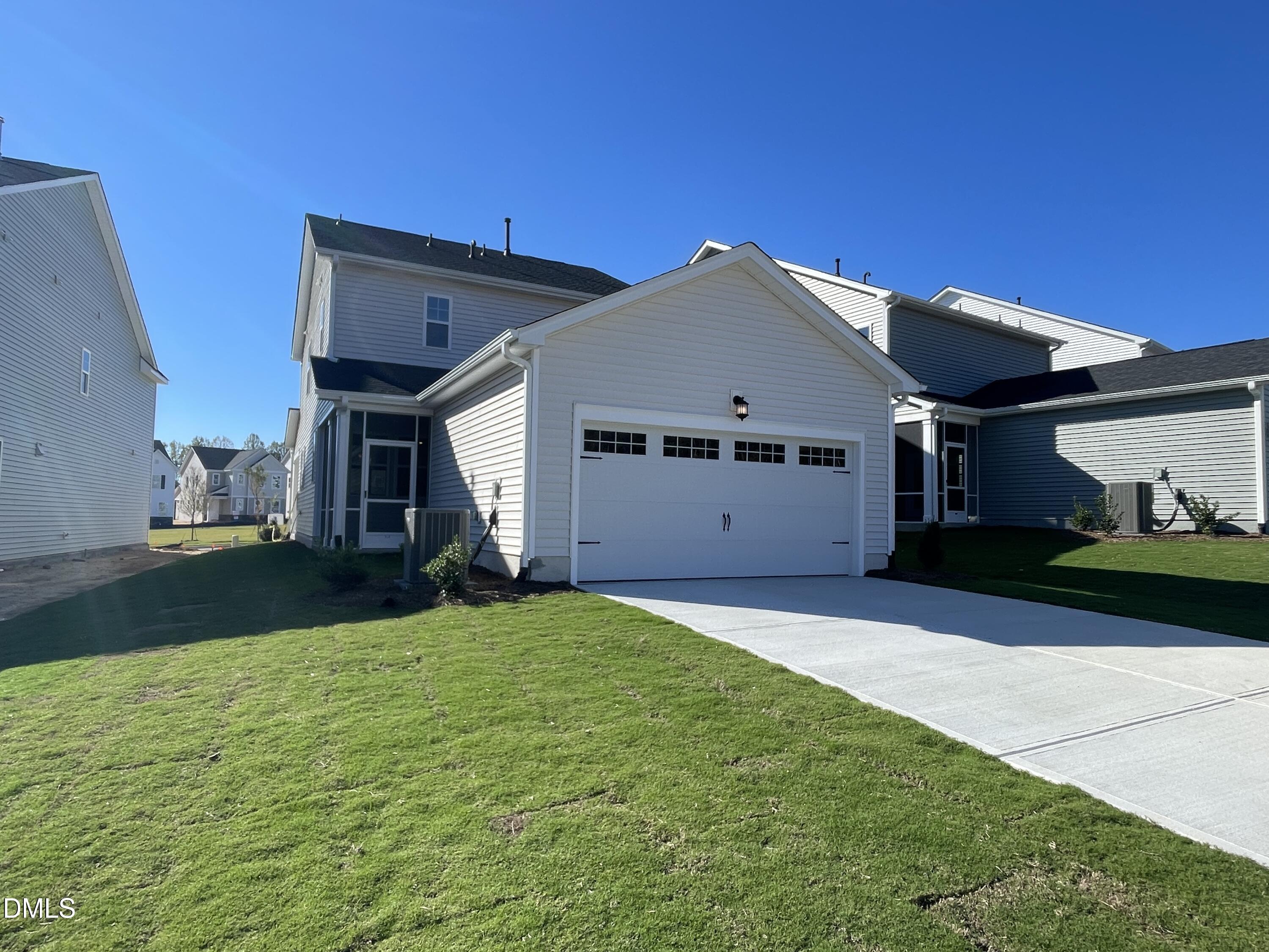 207 Edge Of Auburn Boulevard Raleigh, NC 27610 - Photo 27 of 32 a view of a house with a yard