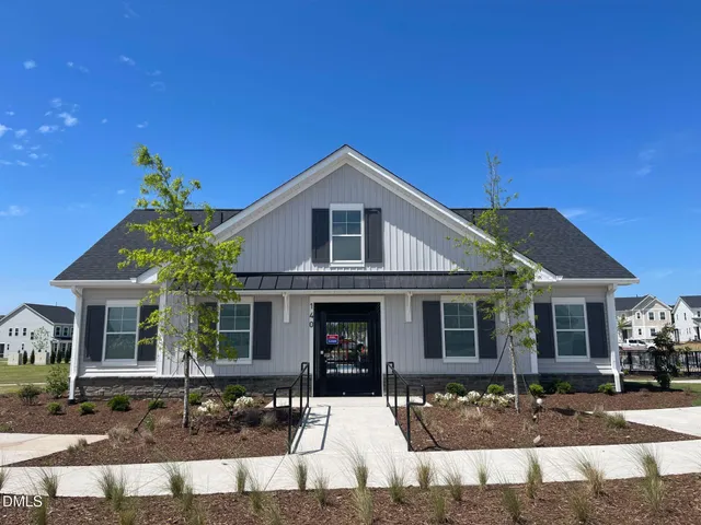 a view of a lake and outdoor seating