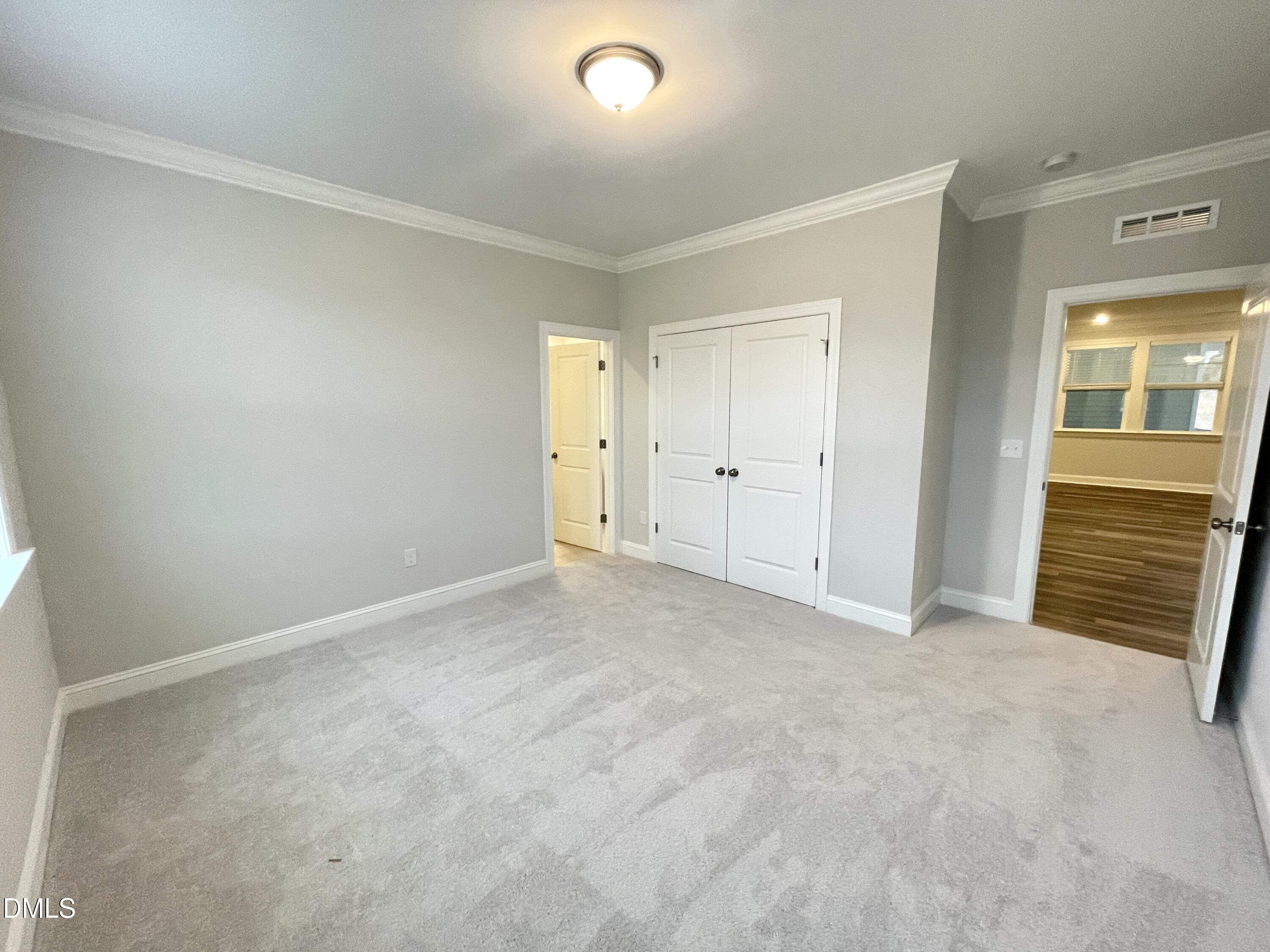 207 Edge Of Auburn Boulevard Raleigh, NC 27610 - Photo 10 of 32 a view of an empty room