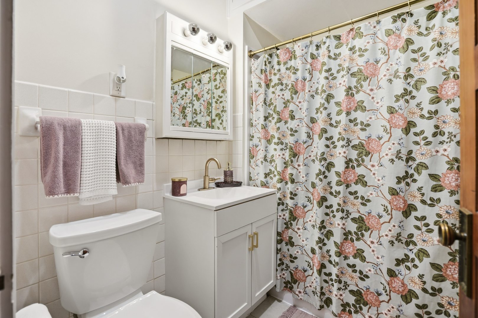 2431 14th Avenue Moline, IL 61265 - Photo 12 of 37 a bathroom with a sink toilet and shower