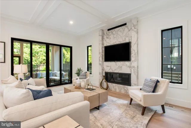a dining room with furniture window and outside view
