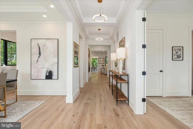 a workspace room with furniture and wooden floor