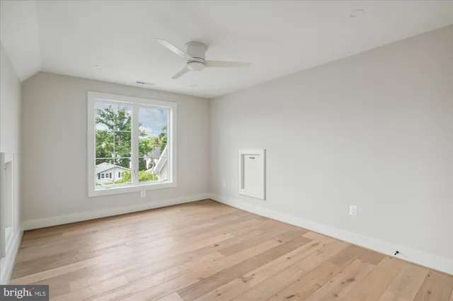 a view of an empty walk in closet