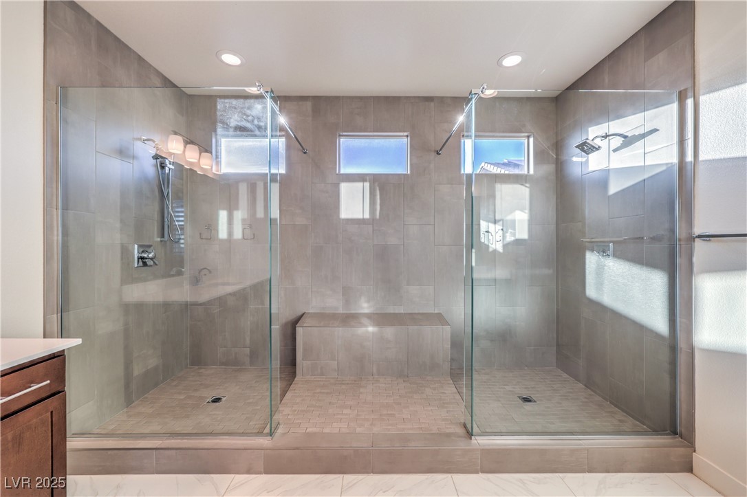 9655 Skye Star Avenue Las Vegas, NV 89166 - Photo 17 of 46 Full bath featuring a stall shower, vanity, and recessed lighting