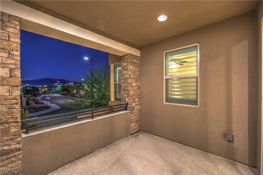 9655 Skye Star Avenue Las Vegas, NV 89166 - Photo 33 of 46 Patio at night featuring a balcony