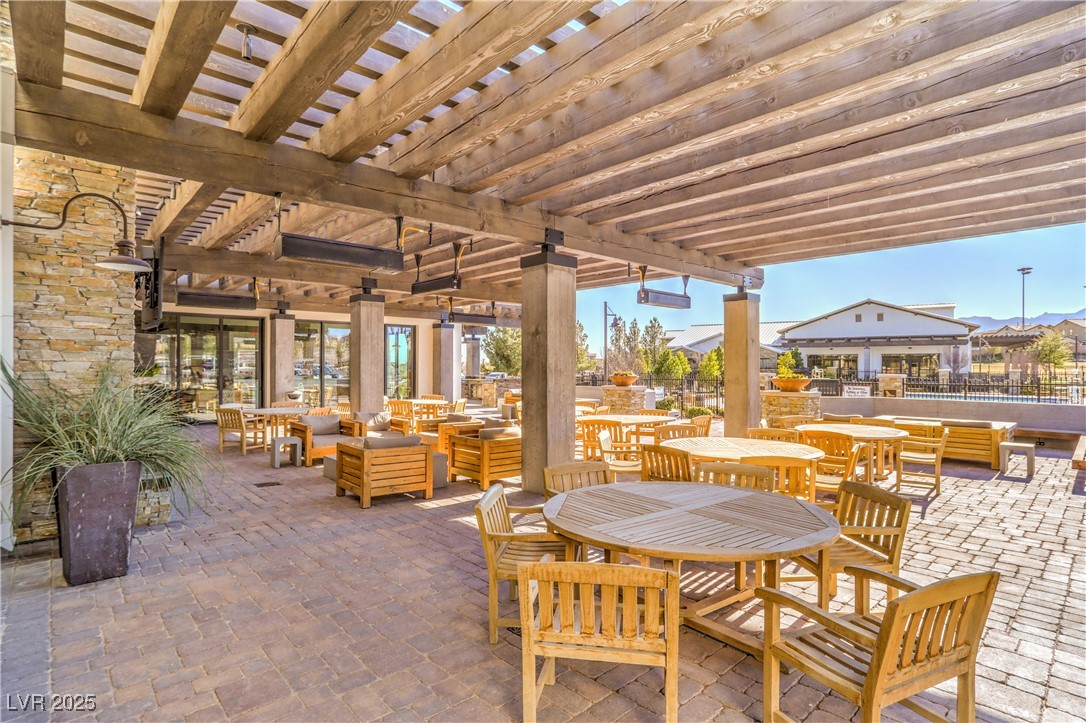 9655 Skye Star Avenue Las Vegas, NV 89166 - Photo 43 of 46 View of patio / terrace featuring outdoor dining area, an outdoor living space, and a pergola