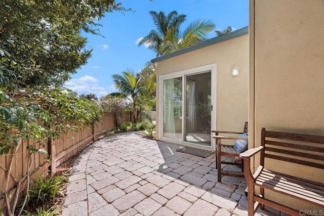 a view of a backyard with garden