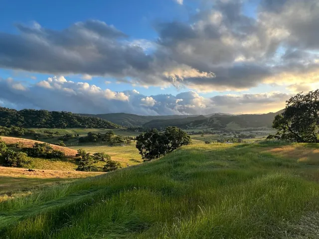 a view of a ocean with sunset