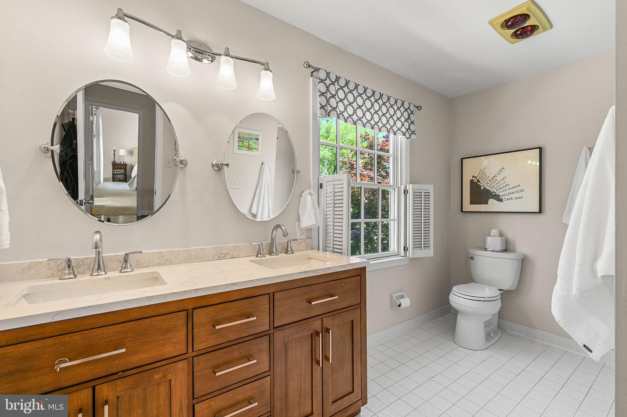 923 Copper Beech Lane Wayne, PA 19087 - Photo 29 of 45 Updated hall bath with quartz double sink vanity
