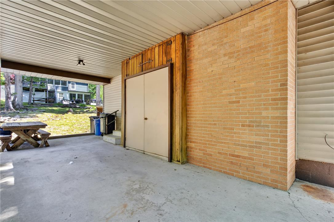 18 White Oak Road Nesquehoning, PA 18240 - Photo 36 of 52 A covered concrete patio provides an inviting space for outdoor leisure.