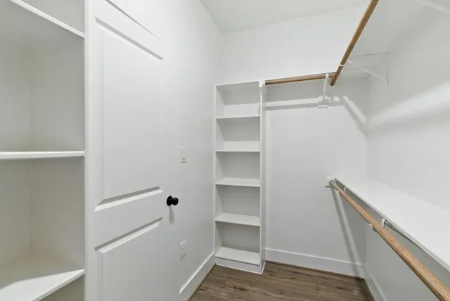 a view of an empty walk in closet
