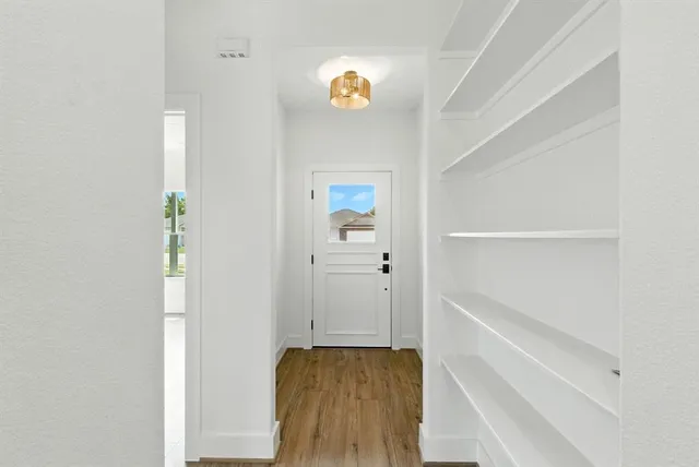 a view of hallway with stairs