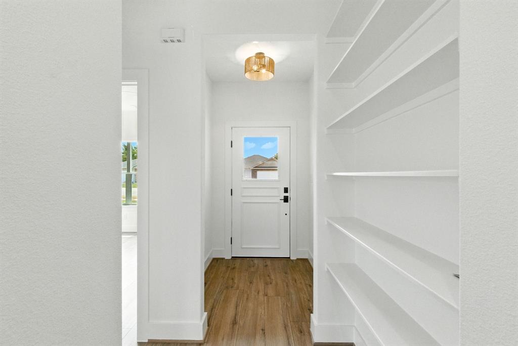 421 Jameson Springtown, TX 76082 - Photo 27 of 37 a view of hallway with stairs